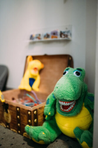 Cozy reading space for kids in the waiting area of dental practice office in Burien, WA