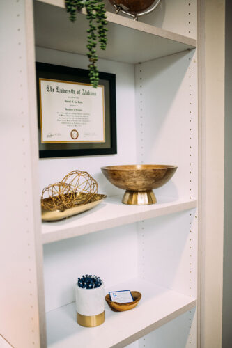 Certificate displayed on a shelf inside Travelle Family Dentistry office in Burien, WA