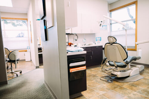 Back view of the modern treatment in the examination room of dentist in Burien, WA