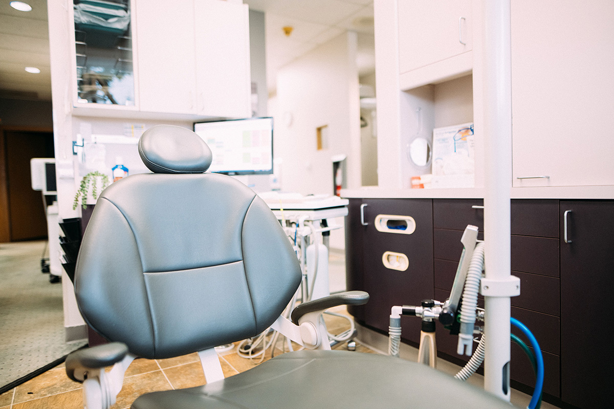 Modern dental treatment chair in the examination room at Travelle Family Dentistry office in Burien, WA